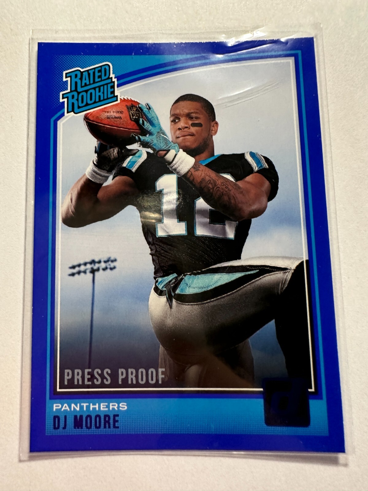 K20,525 - 2018 Donruss Press Proof Blue #316 D.J. Moore RR