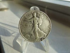 1938 WALKING LIBERTY (50C) HALF DOLLAR COIN, SOME WEAR SCRATCHES DARK TONING.
