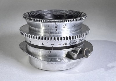 Bausch & Lomb Baltar 20mm lens T2.48 with 3-hole mount for Mitchell 16mm camera