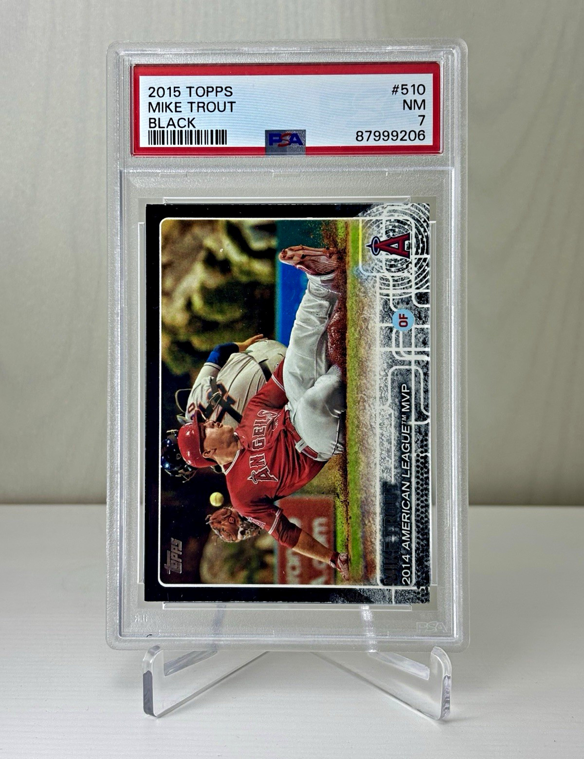 2015 Topps Mike Trout #510 Sliding — Black parallel /64 PSA 7 view 1