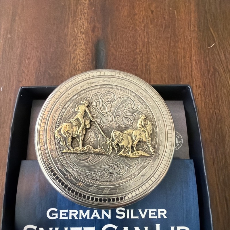 New Montana Silver Team Roping snuff can lid.