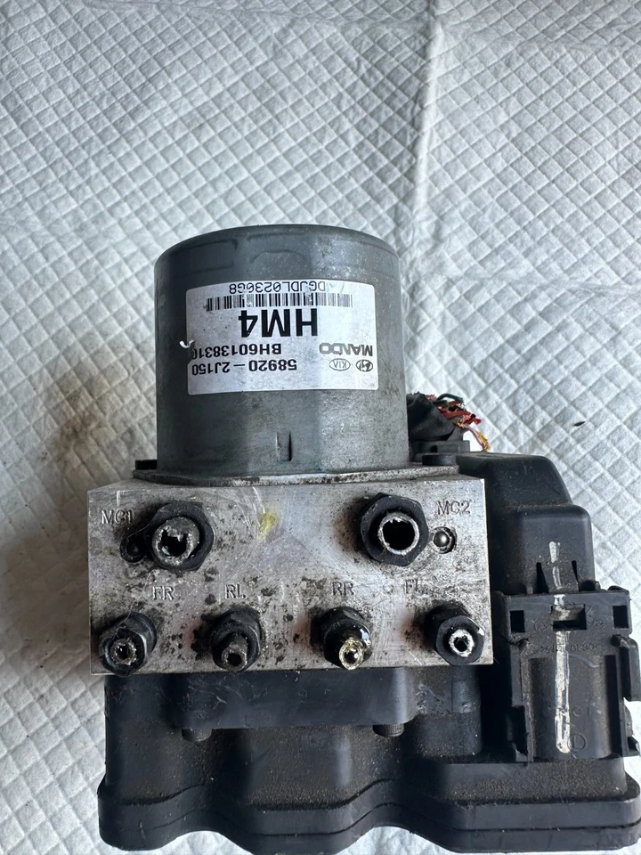 Módulo de control de bomba ABS KIA BORREGO 2009 58920-2J150 OEM (138) Foto 3 de 4