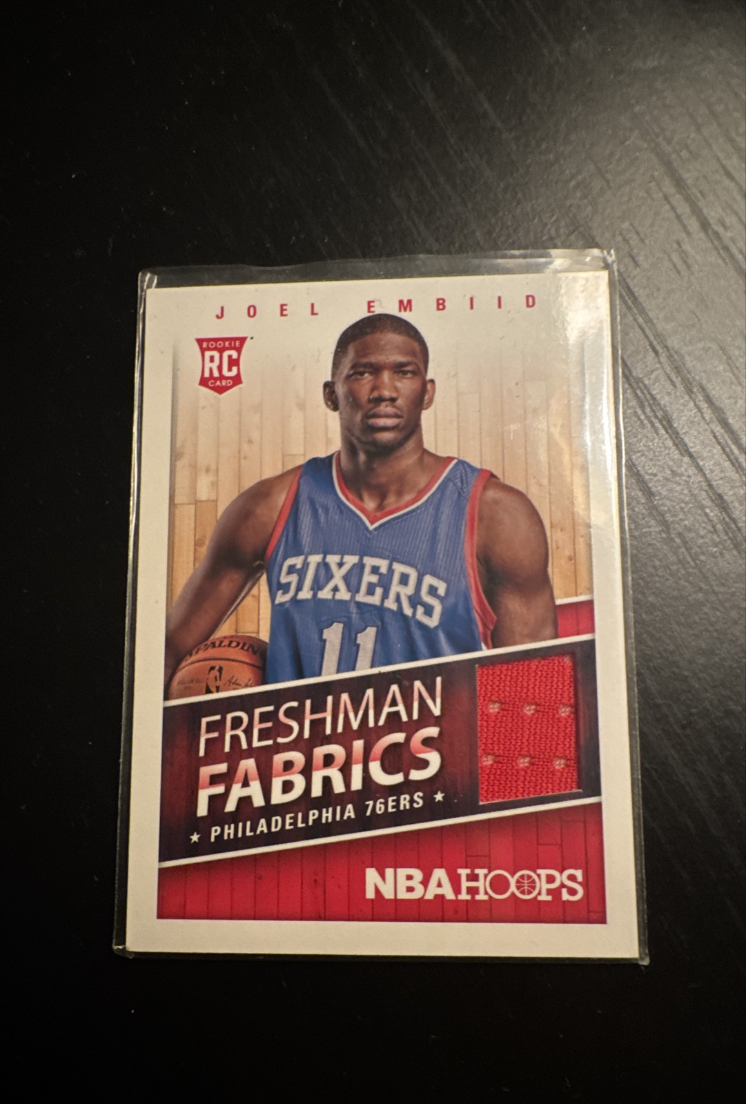 2014-15 NBA Hoops - Freshman Fabrics Joel Embiid #8 (MEM, RC)