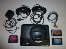 SEGA MEGA DRIVE  PAL-1. MODEL 1601-05. TWO CONTROLLERS, MAINS ADAPTER, 3 GAMES.