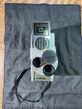 Revere Eye-Matic Spool Eight Camera Case key LensFilters And A Roll Of 8mm Film