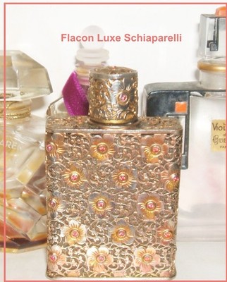 Antiker Luxus Flakon Shocking Schiaparelli Bronze vergoldet Blumendekor mit Rubin verziert