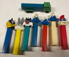 8x Pez Dispensers Bugs Bunny Smurfs Sylvester Daffy Duck
