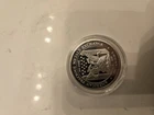 1 OZ  Silver  Round in capsule - APMEX - Sigma Tested .999 pure