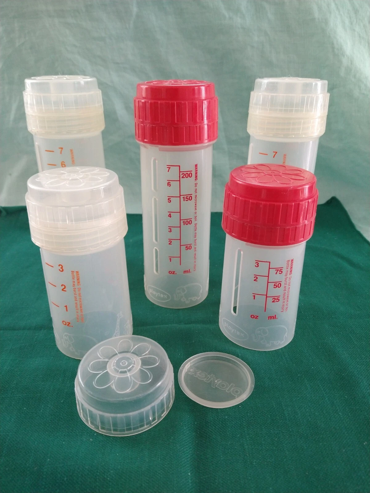 5 Vintage Playtex bottles 3 8oz (1 Red) 2 4oz (1 Red) + extra cap
