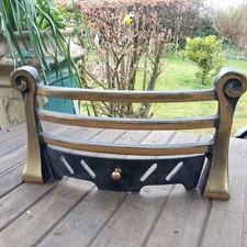 Antique Brass Finish 16” Gas or electric fire  , solid very heavy. 