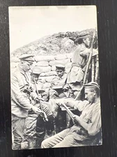 WWI German soldiers in trench smoking reading writing lookout WW1