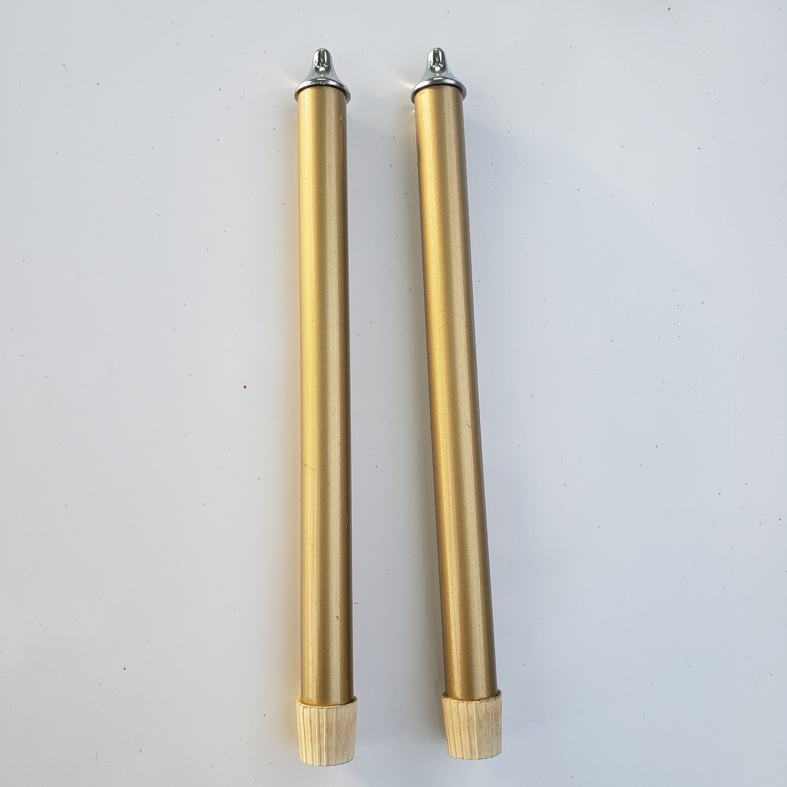 Fluid Burning Taper Candle