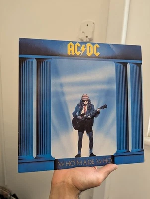 AC/DC - Who Made Who (50th Anniversary 12" Gold Vinyl) Used Bent Cover - Image 1 of 4