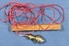 Ovoid parakeet lead. S.XIX Ovoid parakeet plumb bob.