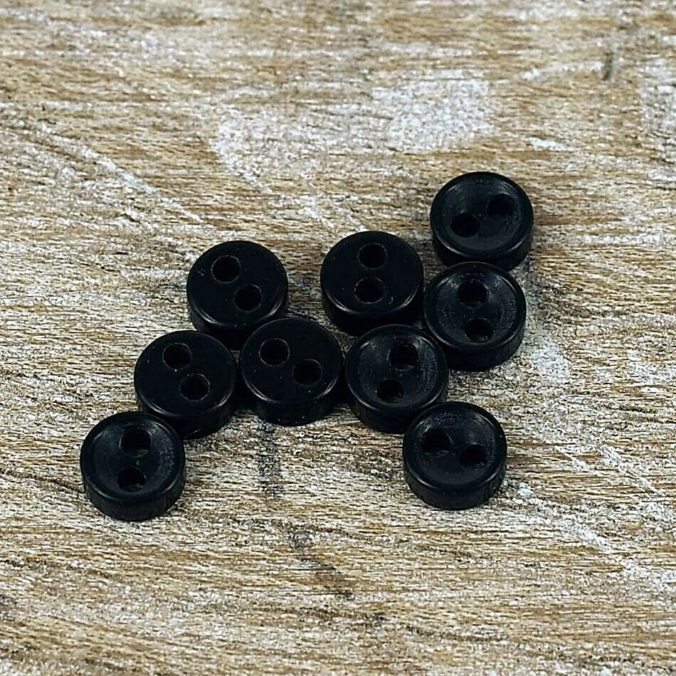 Small buttons best sale for baby clothes