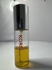 Kors by Michael Kors eau de Parfum Spray 15 ML .5 fl oz Bottle approx 1/2 full