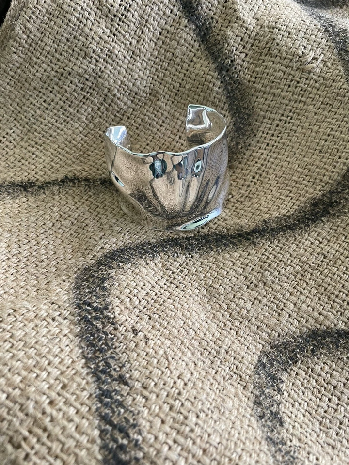 Brazalete Robert Lee Morris Shell Foto 3 de 4