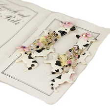 Vintage 1989 Lunch at the Ritz Enamel Moo Moos Cow Chandelier Earrings on Menu