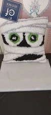 C&F-HALLOWEEN COLLECTION-MUMMY FACE HOOKED PILLOW-MEASURES 8"X8"- NEW-2021 