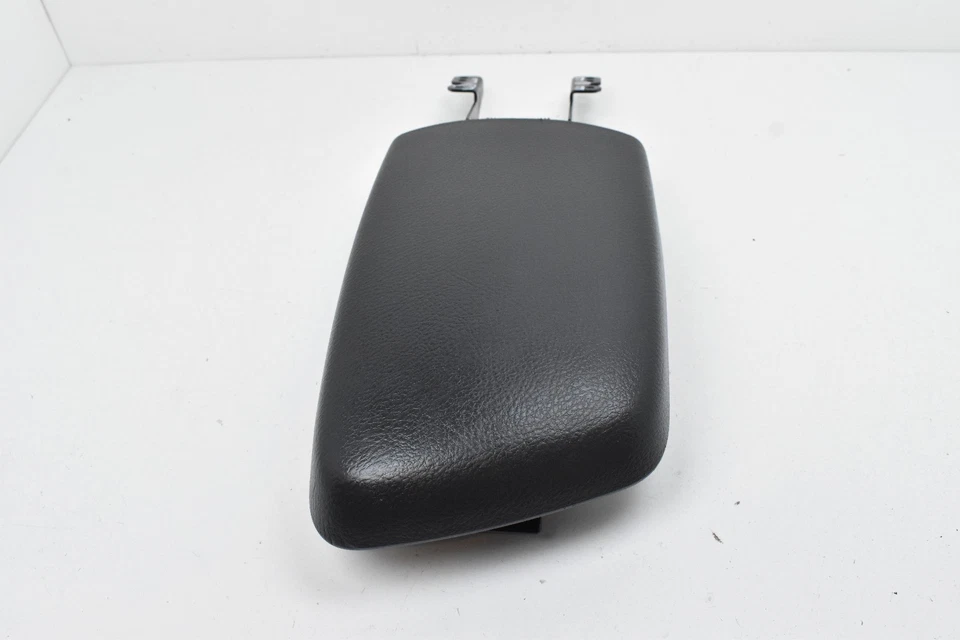 Toyota Yaris 2007-2011 sedán consola central reposabrazos de plástico negro cubierta de tapa OEM Foto 2 de 4