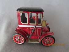 VINTAGE WIND UP TIN LEVER ACTION CAR -TRADE MARK MODERN TOYS -TM