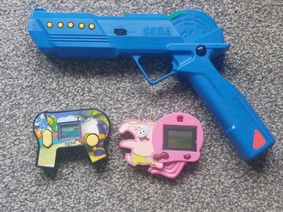 SEGA HI POWER BOOSTER GUN..plus SEGA und VISCOM McDONALD HANDHELD GAMES