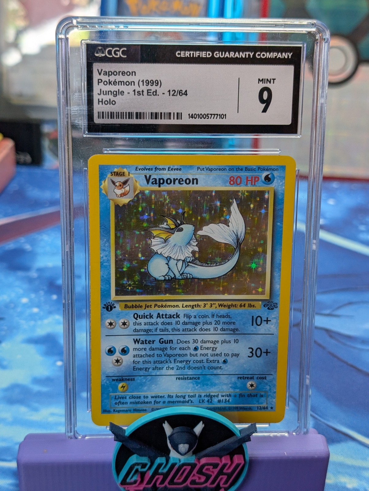 1999 JUNGLE 1ST ED #12 VAPOREON CGC 9