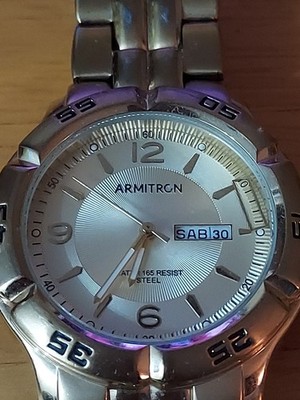 Armitron Men's 20/5395GP Gold Tone Day/date Quartz Watch Rotating Bezel 