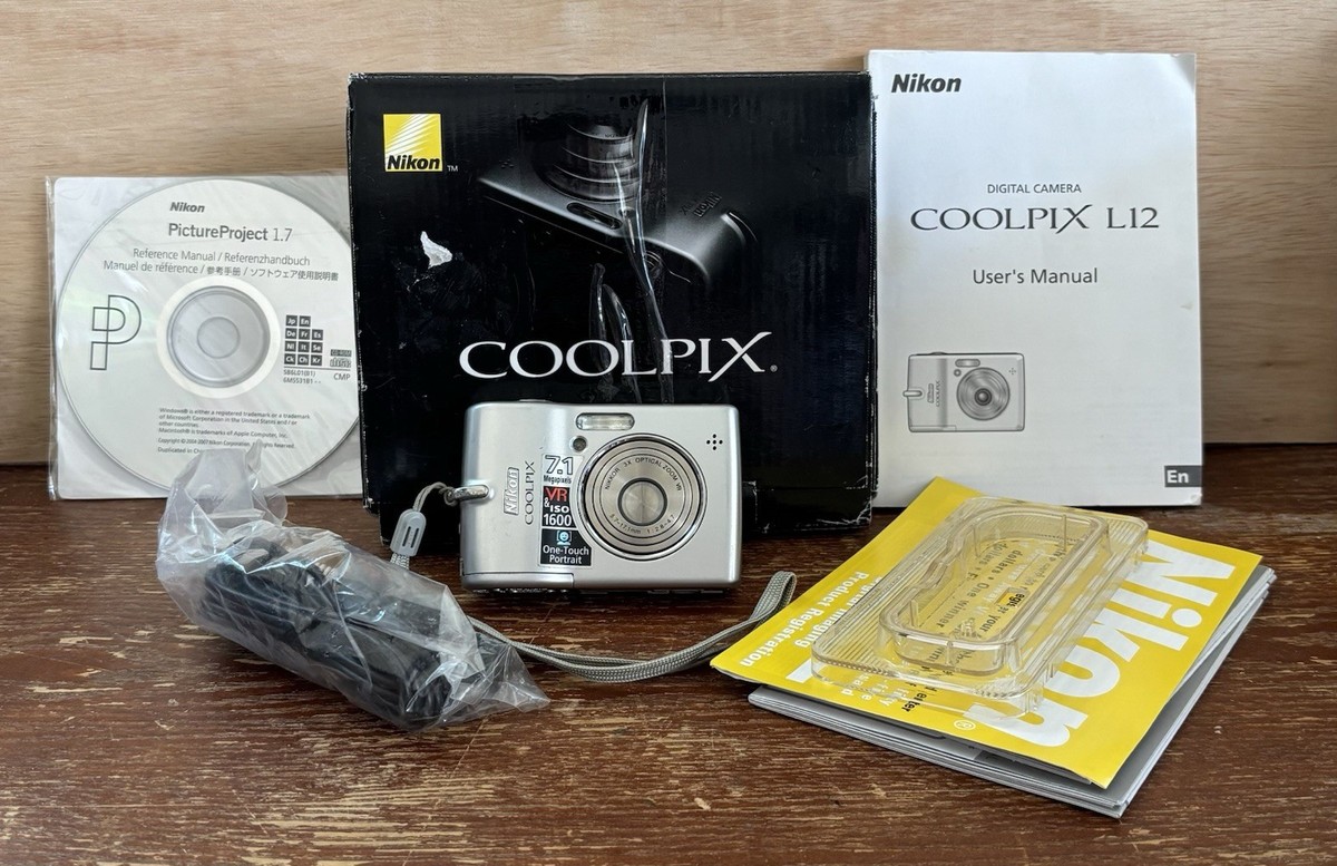 Nikon COOLPIX L12 7.1MP Digital Camera - With Box, Stand, Cords
