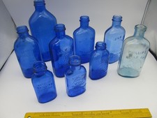 Lot of 9 Vintage Cobalt Blue Glass Phillips Milk of Magnesia Medicine Bottles
