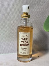  1980s Vintage 1.5 oz Coty Wild Musk cologne spray As Pictured