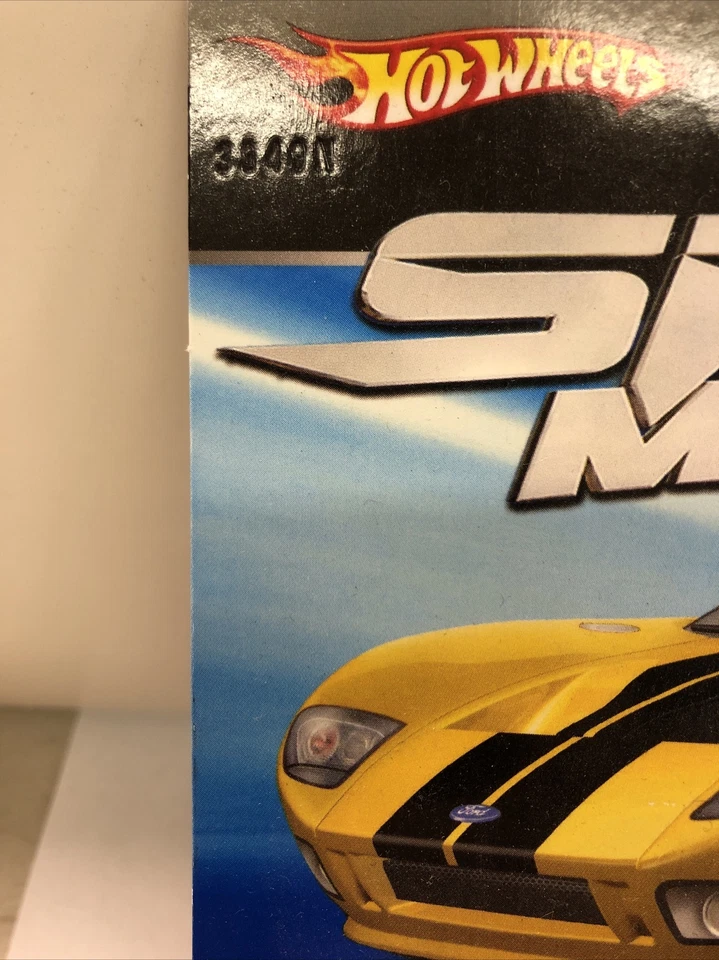 Hot Wheels Speed Machines Ford GTX1 золотистый с черной полосой ̼R8488 - Изображение 3 из 4