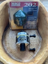 Zebco Omega 33 And Zebco 202 ￼ Fishing Reels. Great Condition.