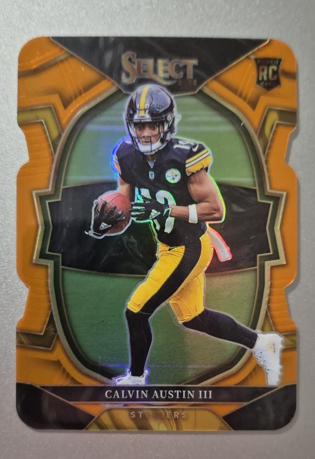 2022 Panini Select - Concourse Calvin Austin III #65 Orange Prizm Die-Cut /199