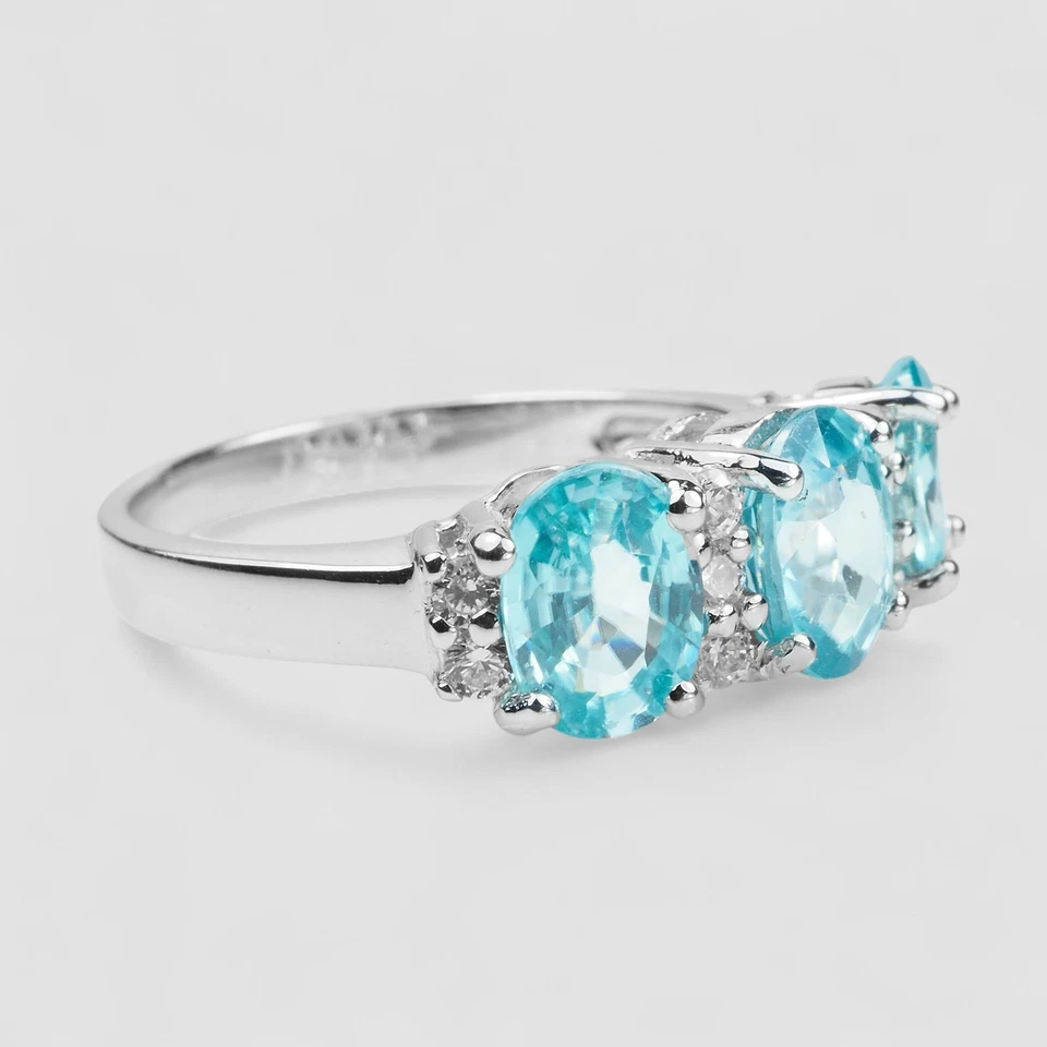 ANEL DE TRÊS PEDRAS PRATA ESTERLINA OVAL ZIRCÃO AZUL NEON 3,30 CT TAMANHO 7 - Imagem 3 de 4