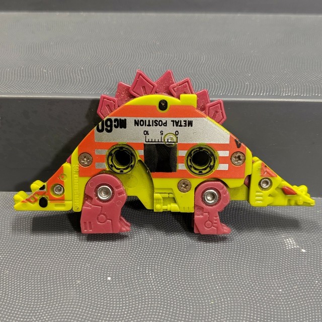 Transformers Slugfest Cassette Tape Stegosaurus Dinosaur Hasbro Takara