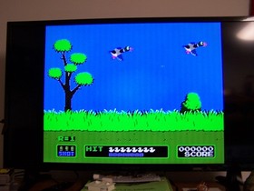 Nintendo NES Super Mario Bros Duck Hunt Game Bundle with Zapper Gun and Sleeve