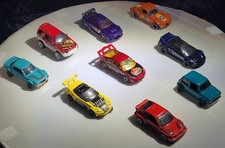 Hot Wheels lotto di 9 veicoli sportivi, rally e stradali asiatici