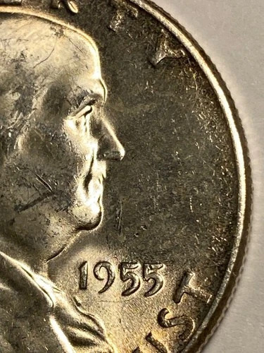 1955p Franklin half dollar "Bugs Bunny" - Uncirculated - Light Toning / Toned