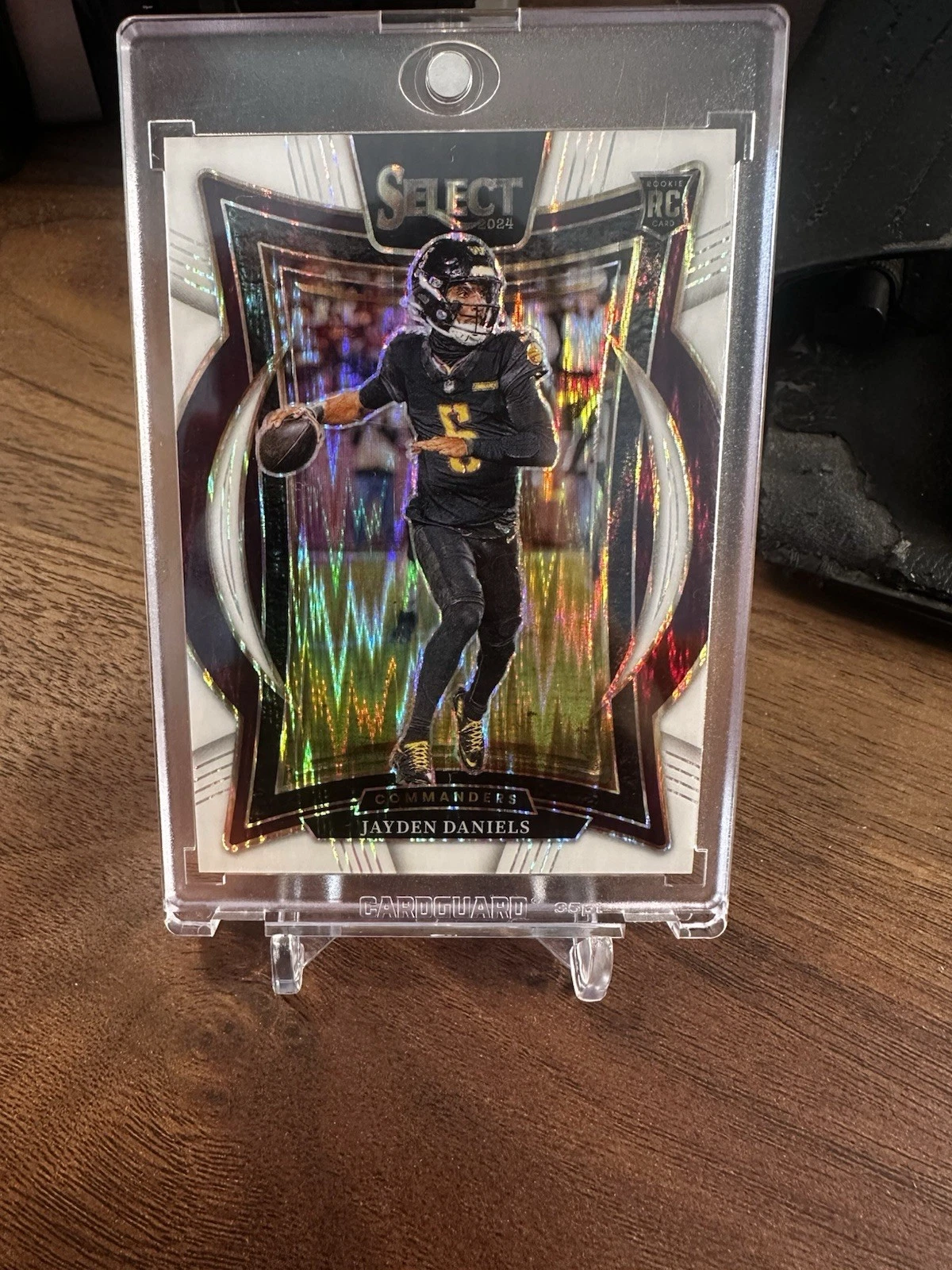 2024 Panini Select - Concourse Jayden Daniels #26 White Prizm Shock /199 (RC)