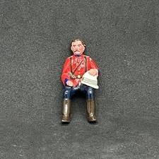 Trophy Miniatures of Wales Zulu War British Officer Seated Holding Helmet
