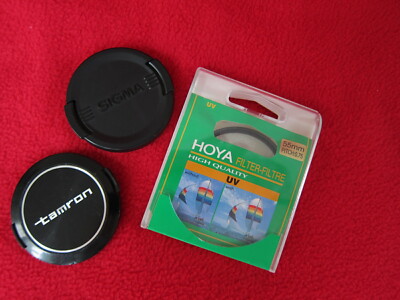 Two 55mm Front Lens Caps plus One HOYA 55MM UV FILTER 