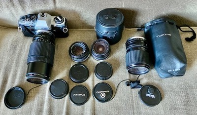 Olympus OM-10 35mm SLR Film Camera w/4 Lenses Tokina and Olympus