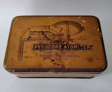 Antiguo atomizador de pirozona prozono y atomizador publicidad médica lata con gráficos