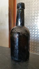 1800s black glass squat small size goldfields bottle