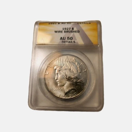 90% BULK SILVER, 1927 Peace Dollar. ANACS -  AU 50.