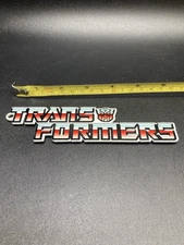 Transformers Porcelain Advertisement Magnet Heavy Duty.