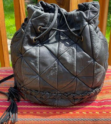 Monserat de Lucca Black Quilted Lux Leather Tassel Bucket Bag Boho Anthropologie