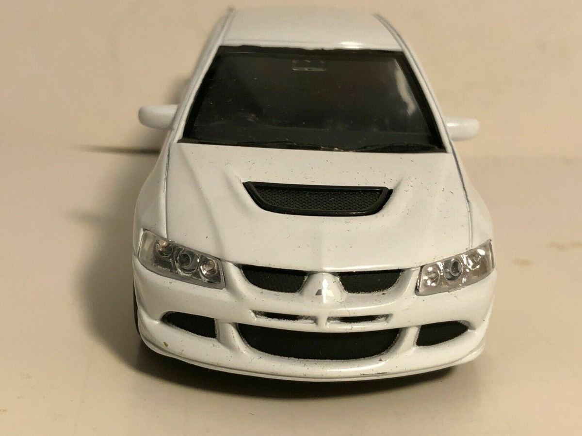 WELLY MITSUBISHI LANCER EVOLUTION XIII EVO 8 WHITE 1:32 PULL BACK
