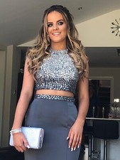 Beautiful titanium grey 2 piece prom dress size 8 used for 4 hours. Dry cleaned 